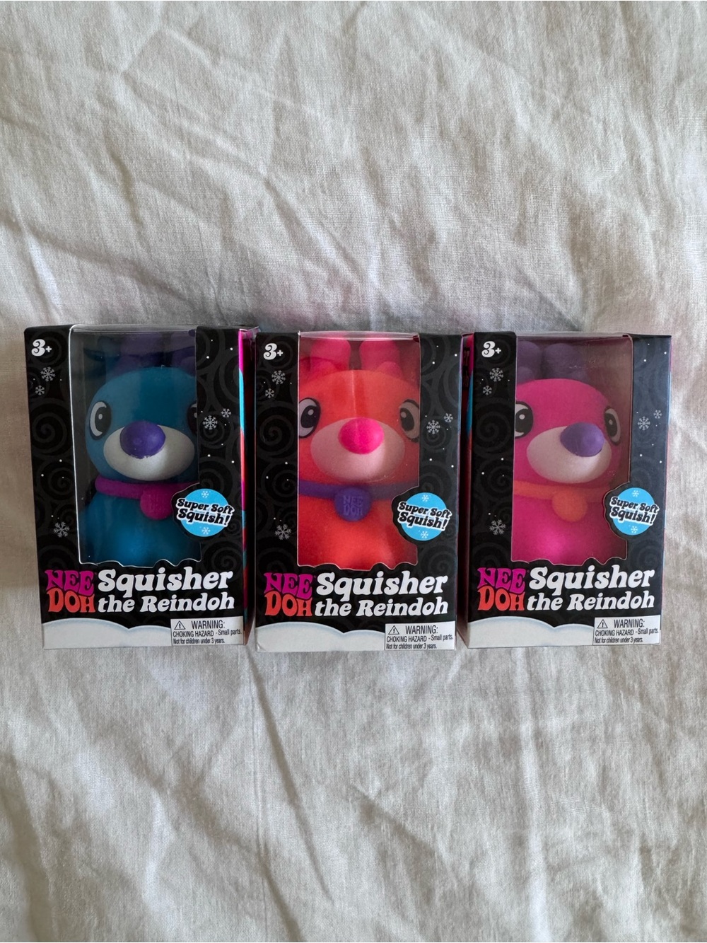 NeeDoh Reindeer set of 3: Nee Doh Squisher the Reindoh - Blue, Orange, Pink